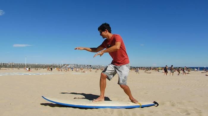 Surf coach showing correct surf stance